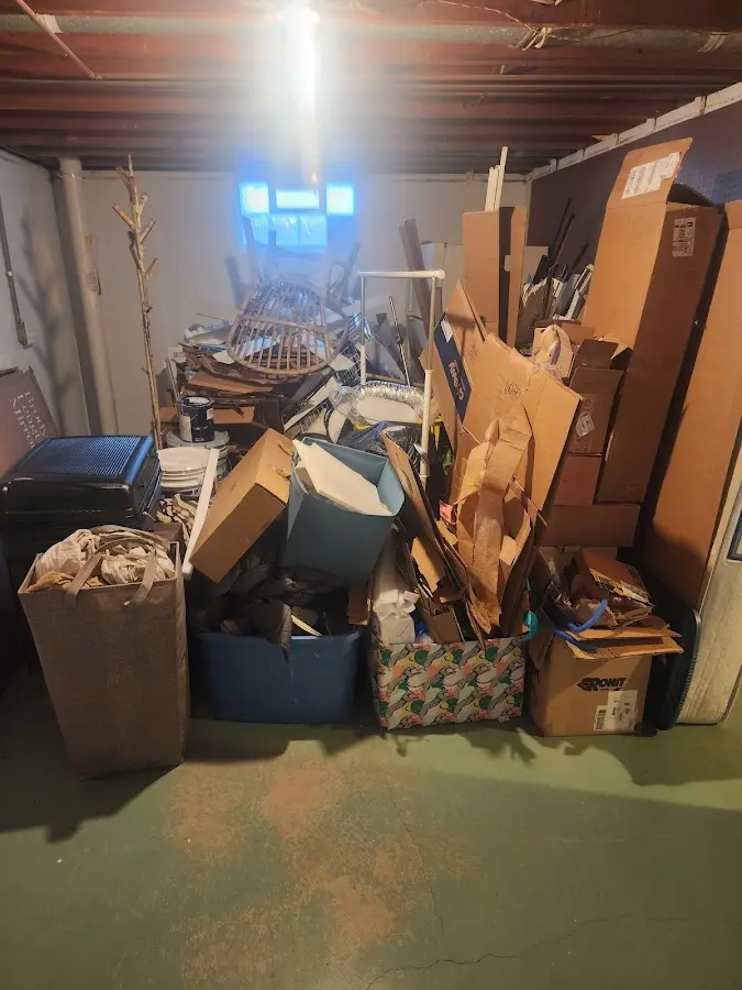 Roll-off dumpster container at job site for 4 Yard Dumpster Rental in Half Moon